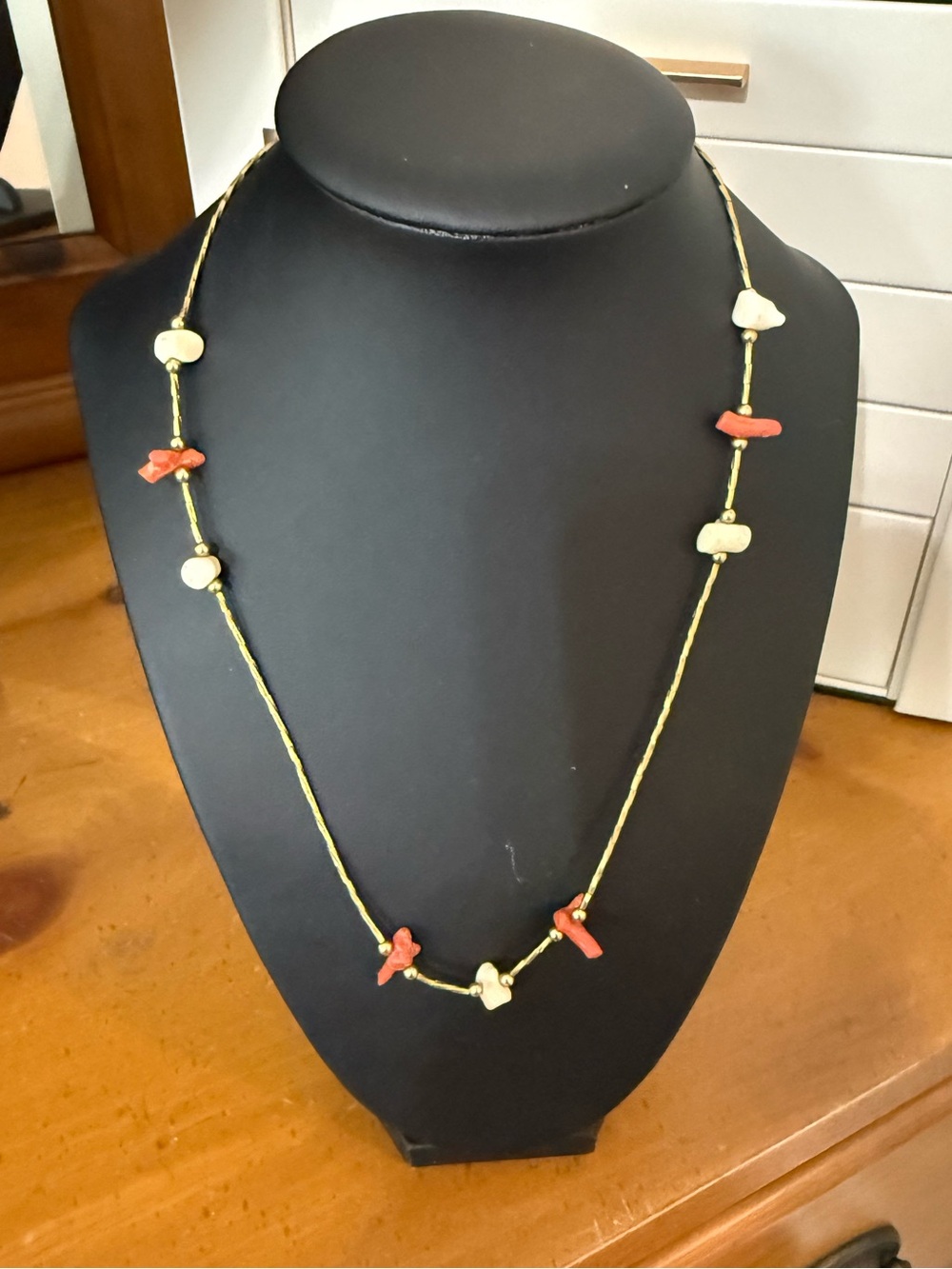 Gold tone orange bird  & Cream Bead Necklace